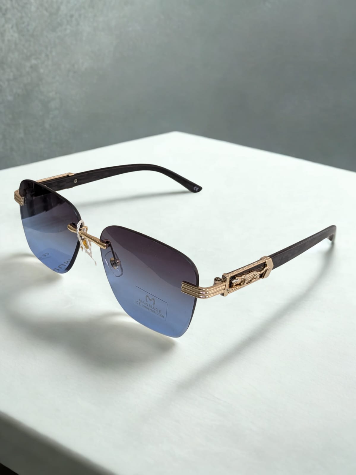 Designer Blue Gradient Rimless Sunglasses with Embossed Panther Detail